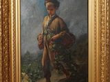 un tableau représentant un homme tenant un panier de fleurs à la main
