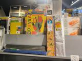 many different types of food on display in a store