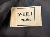 an image of a label on a jacket that says well