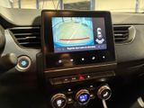 a picture of a car dashboard with a gps device in it