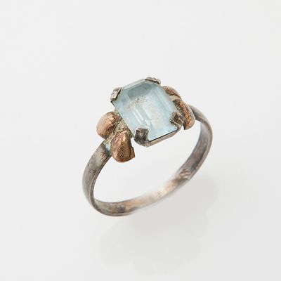 a close up of a ring with a stone on it