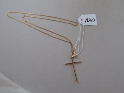 two gold necklaces with a cross and a tag on a white background