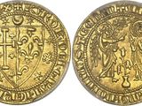 a gold coin with an image of a woman holding a cross