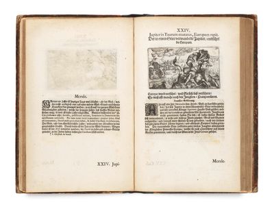 an open book with a picture of a man riding a horse on it