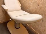 a chair that is sitting in the corner of a room