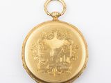 an image of a gold locke with a picture of a horse on it