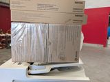 a stack of boxes on top of a printer