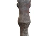statue of a woman standing on a pedestal on a white background