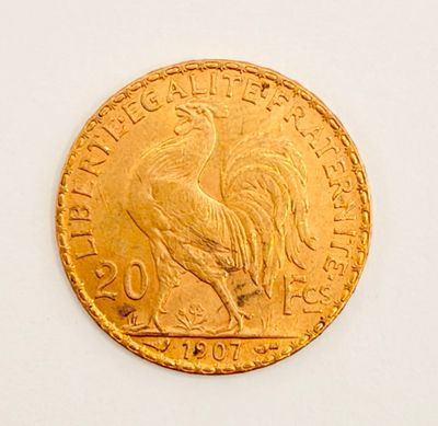 an image of a gold coin with a rooster on it