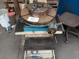 a machine that is sitting on a table in a garage