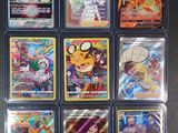 a lot of pokemon cards on the table
