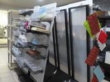 a refrigerator that is in the middle of a store