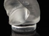 an image of a glass sculpture of a woman ' s head