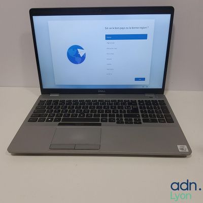 an open laptop computer sitting on top of a white table