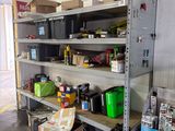 many boxes and boxes on the shelves in the garage