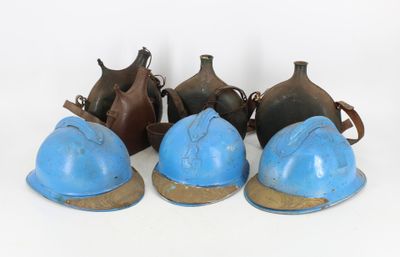 five blue helmets sitting next to each other on a white surface