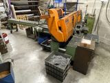 a picture of a machine that is working on a piece of wood