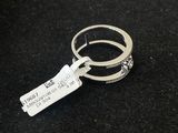 an image of a ring with a tag attached to it