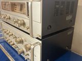an image of a couple of stereo equipment sitting on top of a blue counter