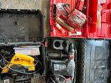 a lot of tools that are laying out on the floor
