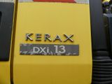 a close up of a yellow truck with the name kerax on it