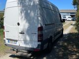 a van that is parked on the side of the road