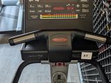 a close up of a tread on a machine in a gym