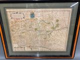 an old map of the city of london in a wooden frame