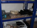 a shelf with many items on it in a room
