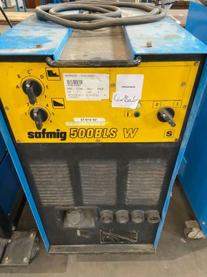 a close up of a machine with a hose on it