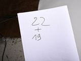 a piece of paper with the number twenty on it