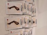 several packages of hair clips are on a white surface