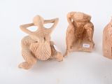 three figurines that are sitting next to each other