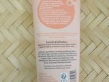 an image of a tube of hand sanitizer on a bamboo mat