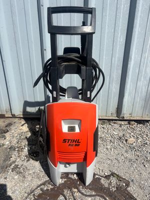 a close up of a small electric pressurer on the ground