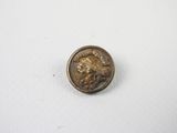une image représentant une pièce de monnaie sur laquelle figure un visage