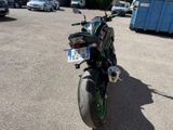 a motorcycle that is parked in a parking lot