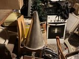 a pile of junk in the corner of a room