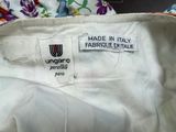 a label that says made in italy on the inside of a purse