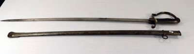 two old swords sitting on top of a table next to each other
