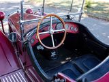 a close up of a red car with a steering wheel