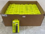 a box full of yellow batteries sitting on the floor
