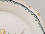 a plate with a design on it on a table