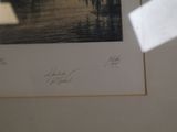 a picture of a picture hanging on the wall of a room