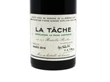 a bottle of wine that is sitting on a table