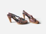 a pair of women ' s shoes on a white background