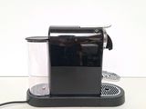 a coffee maker that is sitting on a table