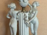 a statue that is sitting on top of a table