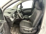 the interior of a car with the door open and the driver ' s seat down