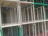 many shelves that are on the side of a building